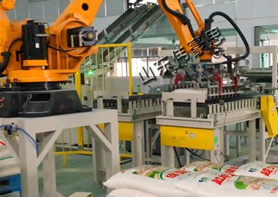 水泥全自動碼垛機械手在企業里起了什么作用